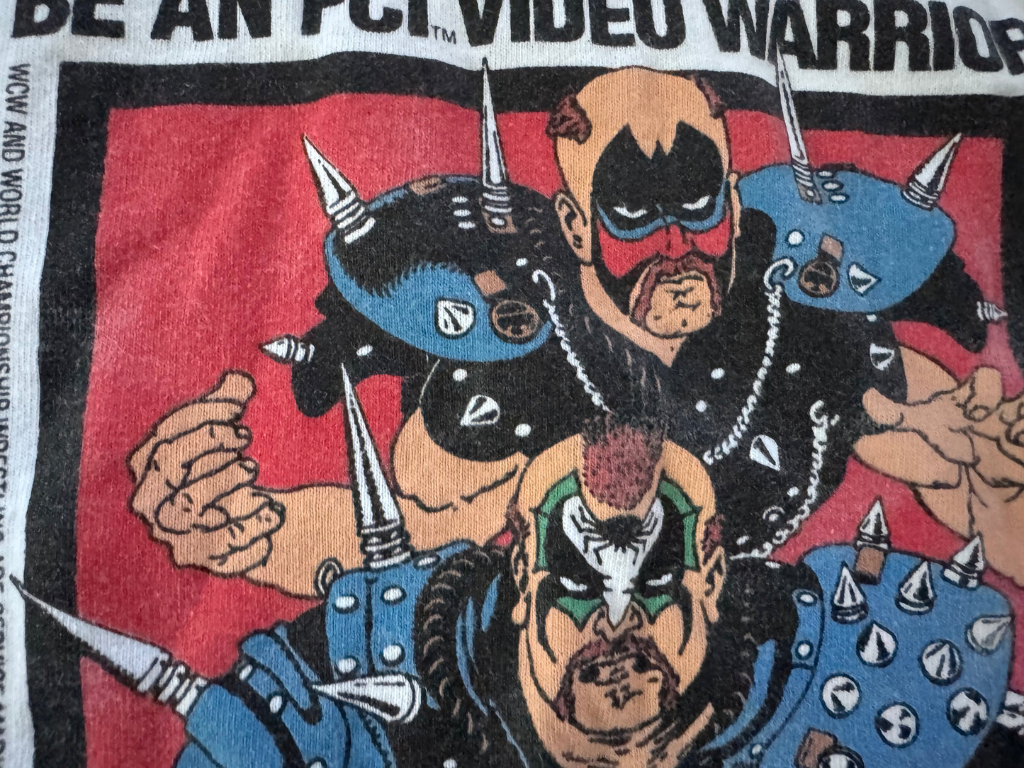 1990 WCW / FCI World Championship Wrestling for Nintendo shirt featuring The Road Warriors: Hawk and Animal