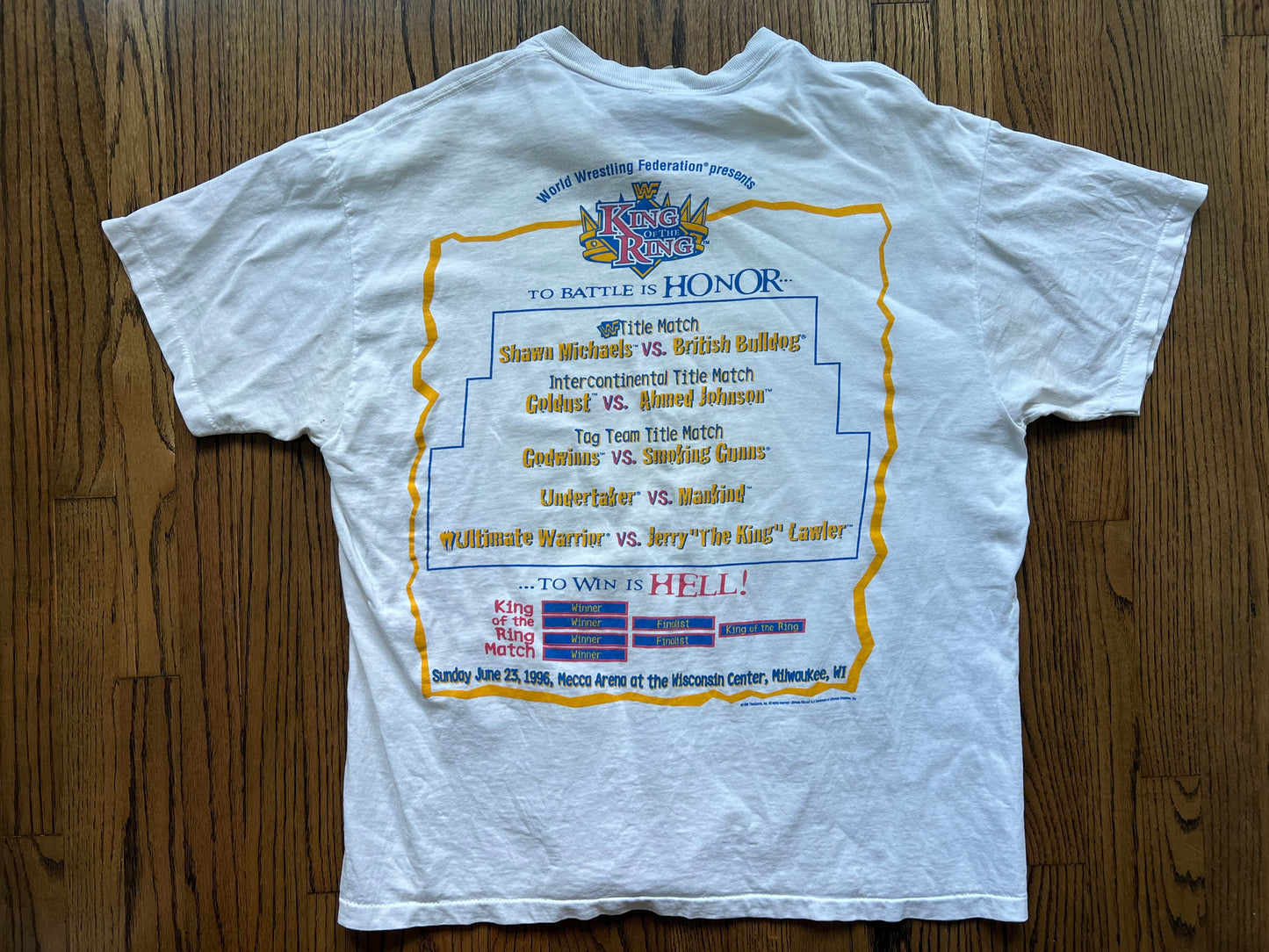 1996 WWF King of the Ring two sided shirt featuring the Ultimate Warrior and the card on the back