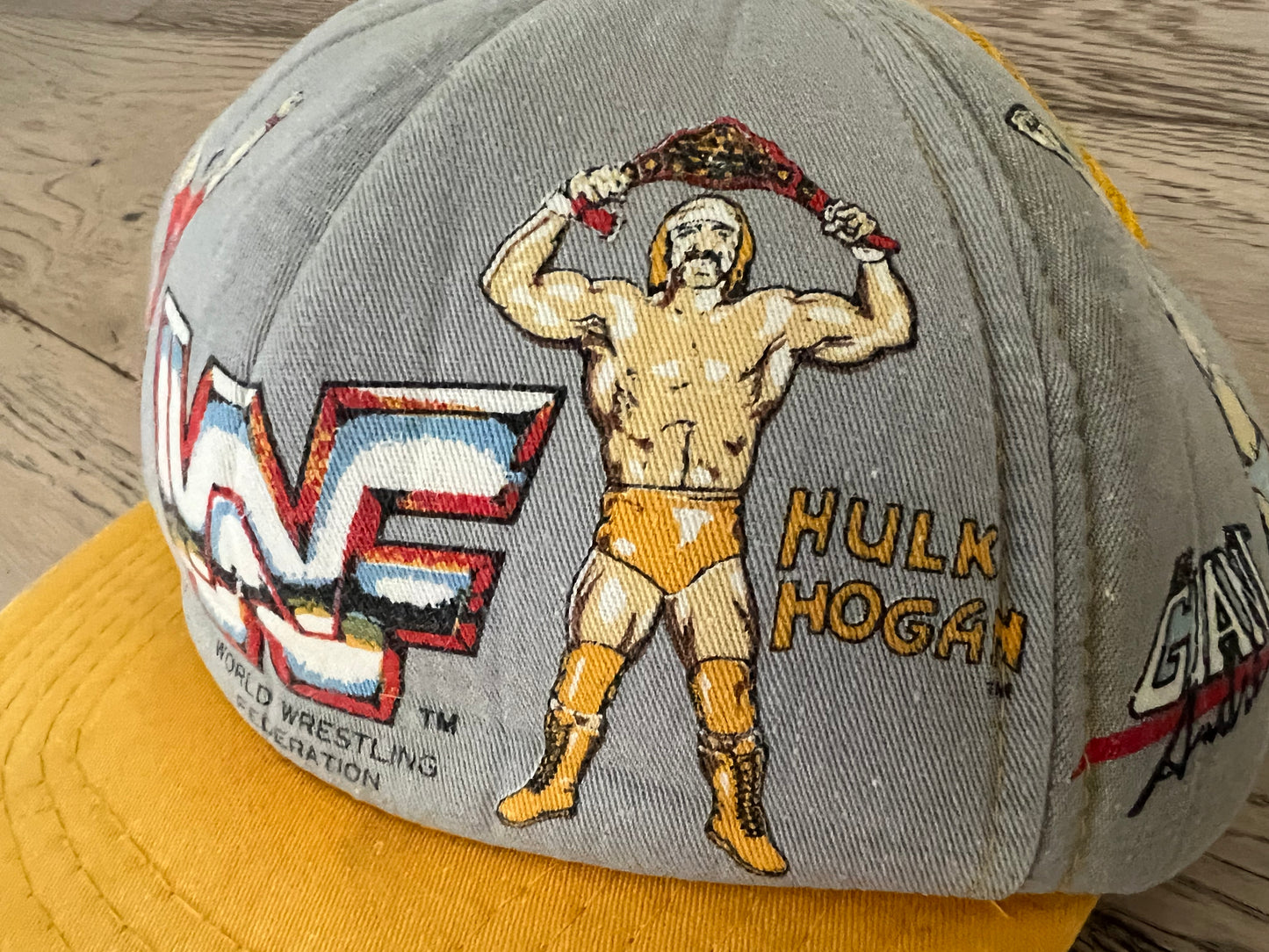 1985 WWF Kid’s Hat featuring World Wrestling Federation Heavyweight Champion Hulk Hogan, “Superfly” Jimmy Snuka, Andre the Giant and “Rowdy” Roddy Piper