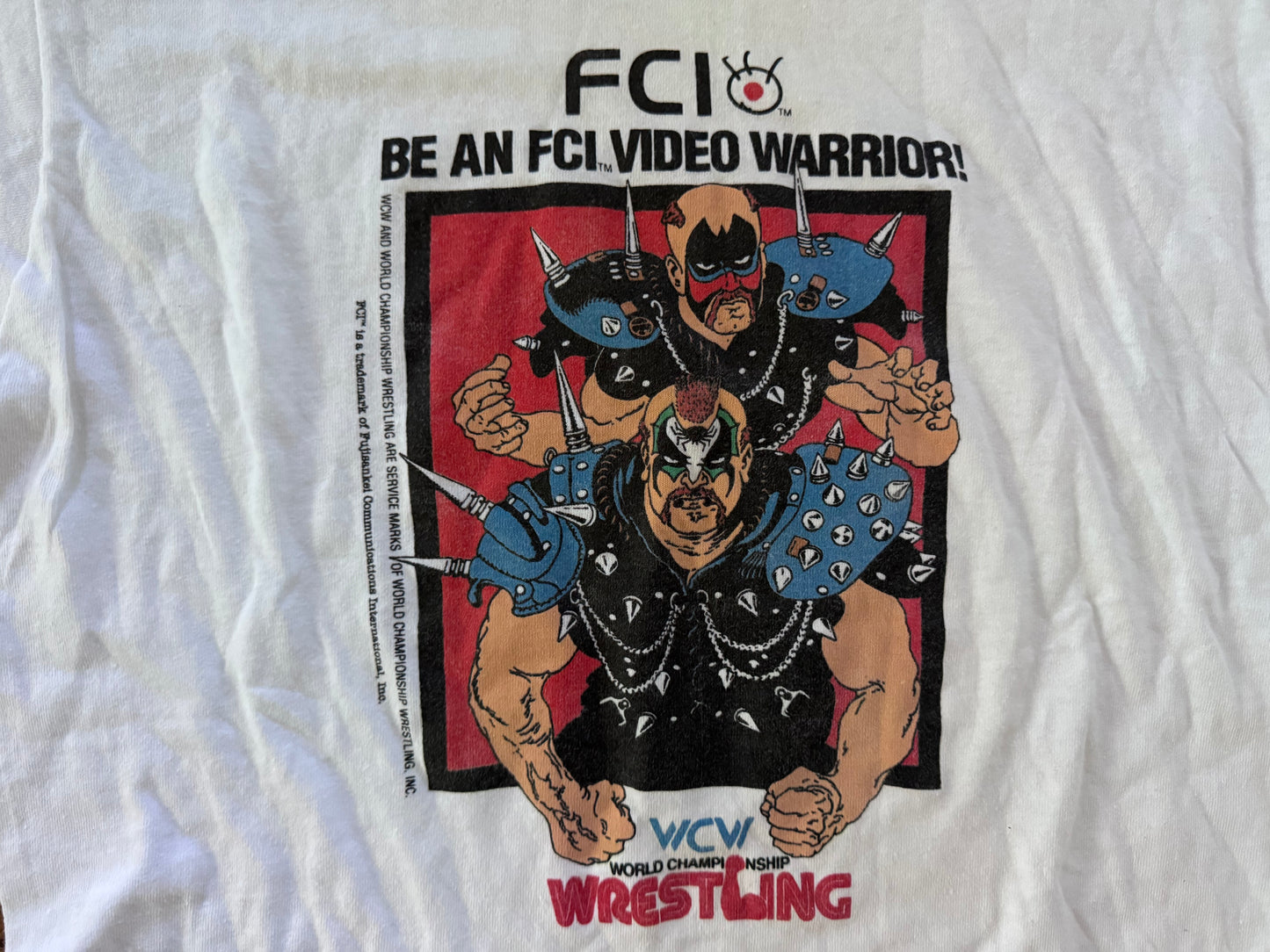 1990 WCW / FCI World Championship Wrestling for Nintendo shirt featuring The Road Warriors: Hawk and Animal