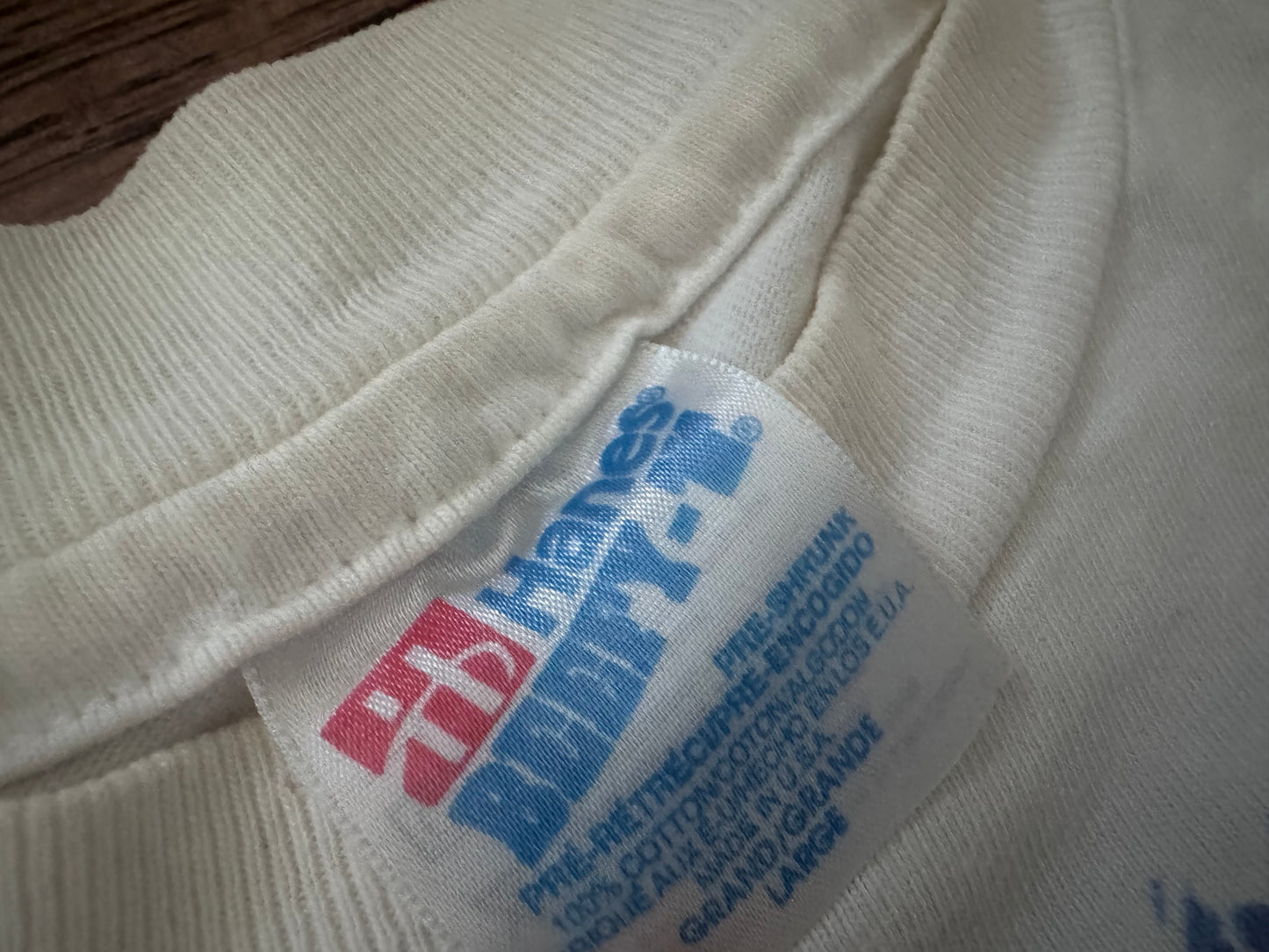 1995 WWF Royal Rumble shirt featuring a Flamingo, Bam Bam Bigelow, Crush’s 3rd gimmick in 3 years, Tatanka, Fatu, Sir Mo, Maybe the Smoking Gunns? Palm Trees, Lex Luger and Adam Bomb