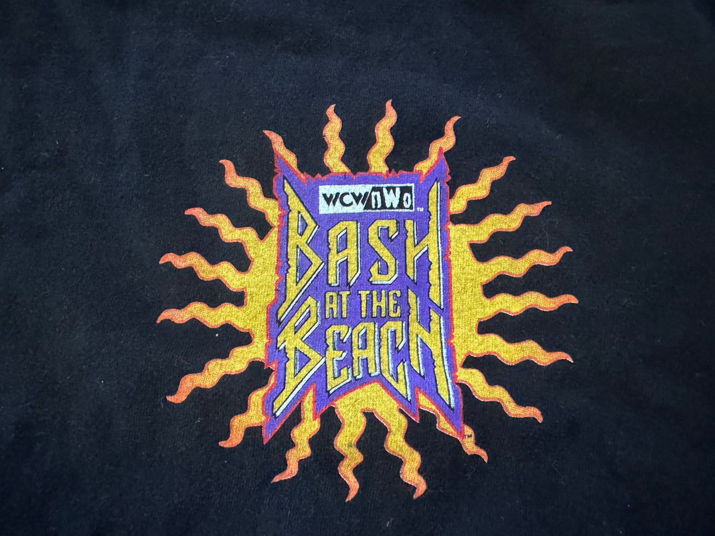 1998 WCW / n.W.o. Bash at the Beach event shirt featuring “Hollywood” Hulk Hogan, “Rodzilla” Dennis Rodman, “The Mailman” Karl Malone and Diamond Dallas Page

Size: XXL