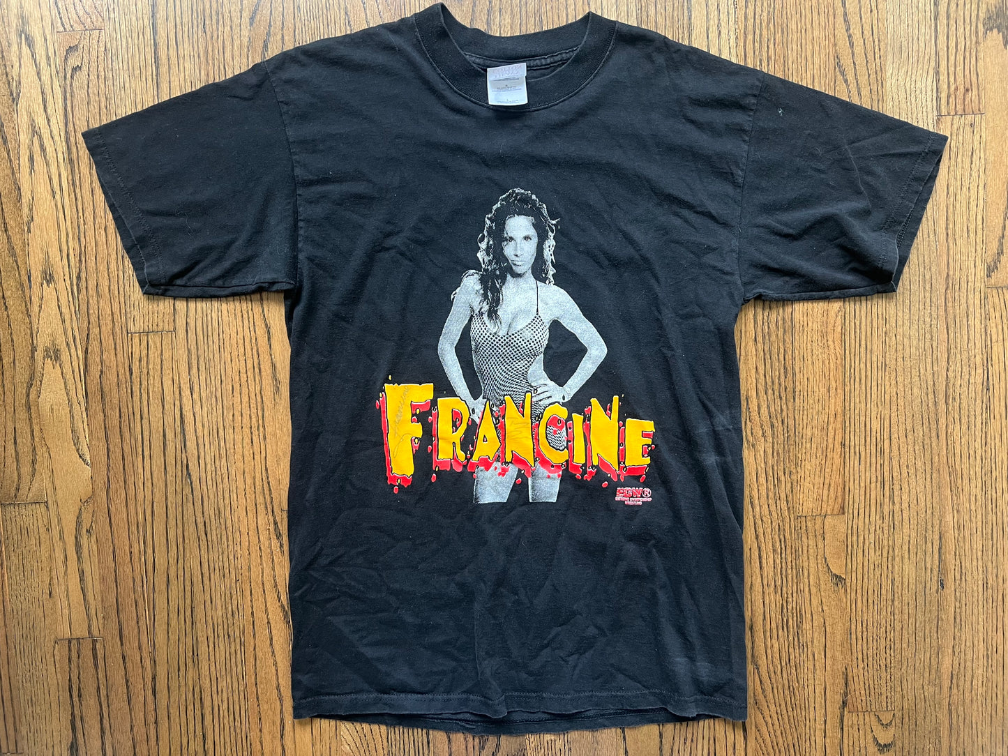 1998 ECW Francine “Ain’t Just T&A” two sided shirt with faint Francine and Tommy Dreamer signatures