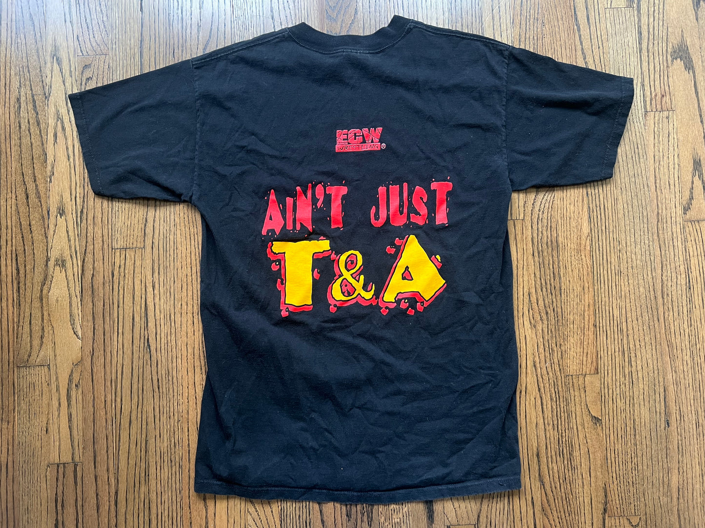 1998 ECW Francine “Ain’t Just T&A” two sided shirt with faint Francine and Tommy Dreamer signatures