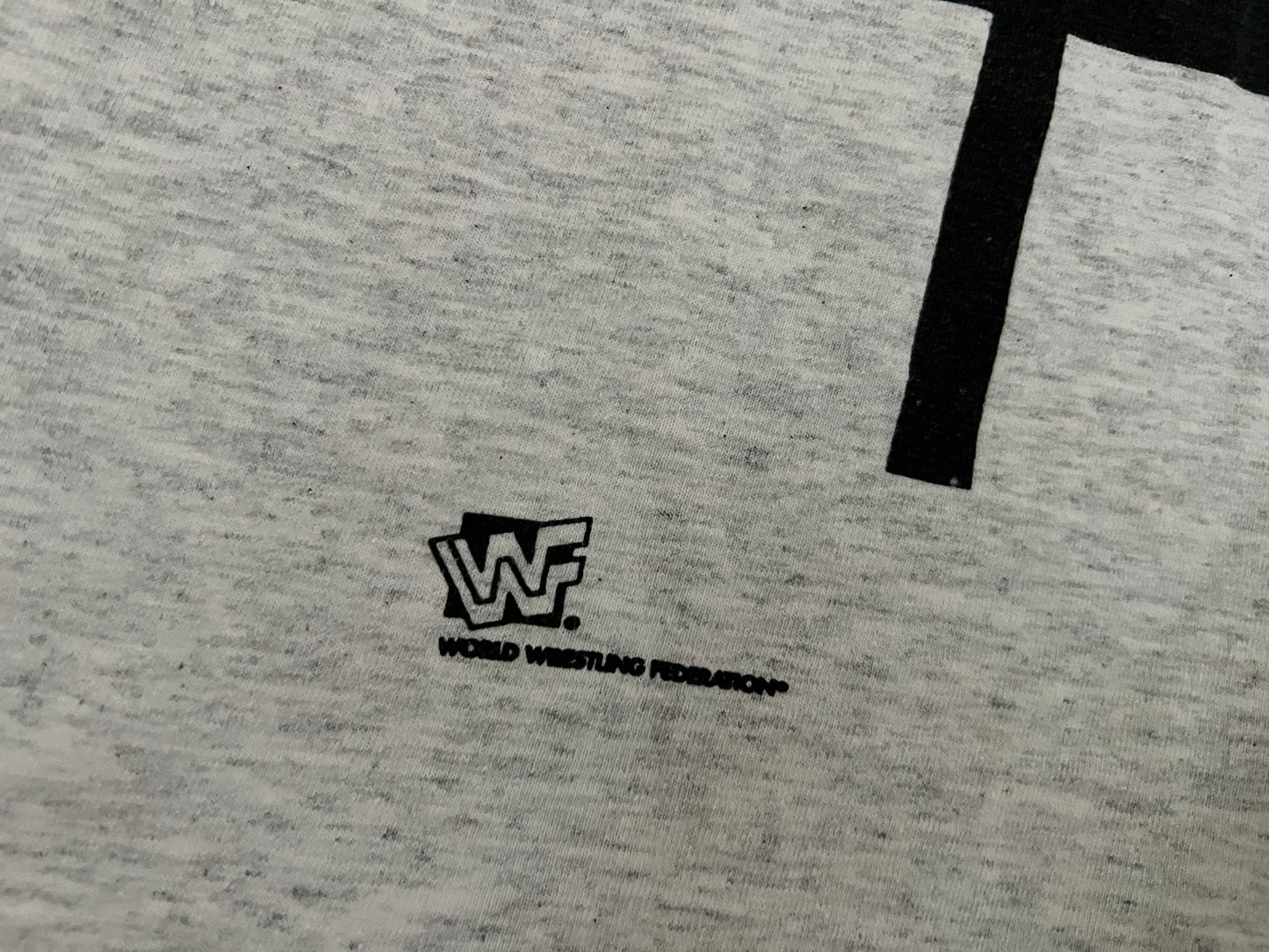 1995 WWF Logo “Officially XL Tee” shirt with big print and printed Airbrush logo on the back
