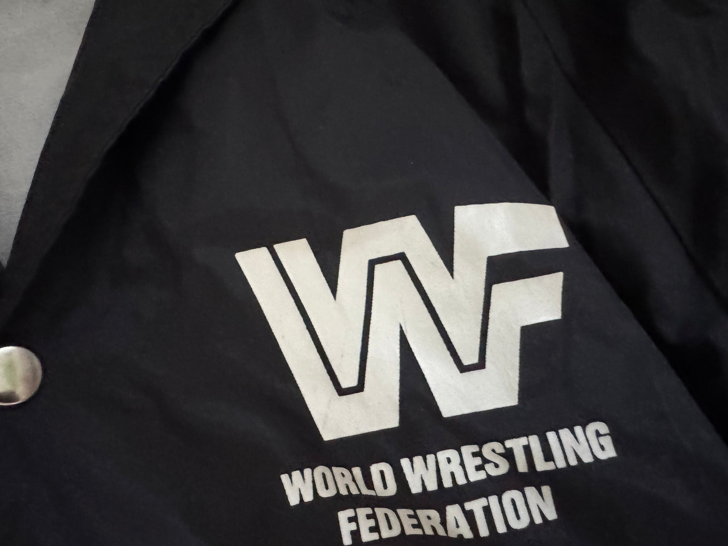 1995 WWF Undertaker windbreaker jacket with a zip up