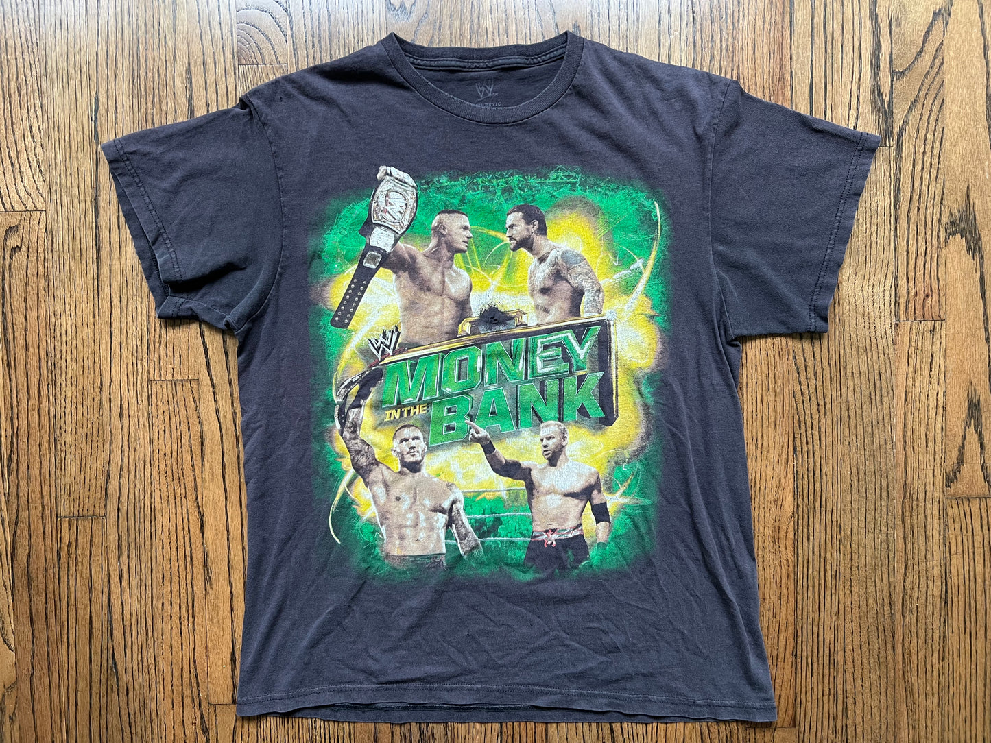 2011 WWE Money In The Bank two sided event shirt featuring Randy Orton, CM Punk, John Cena, Christian and many others on the back (flaws)