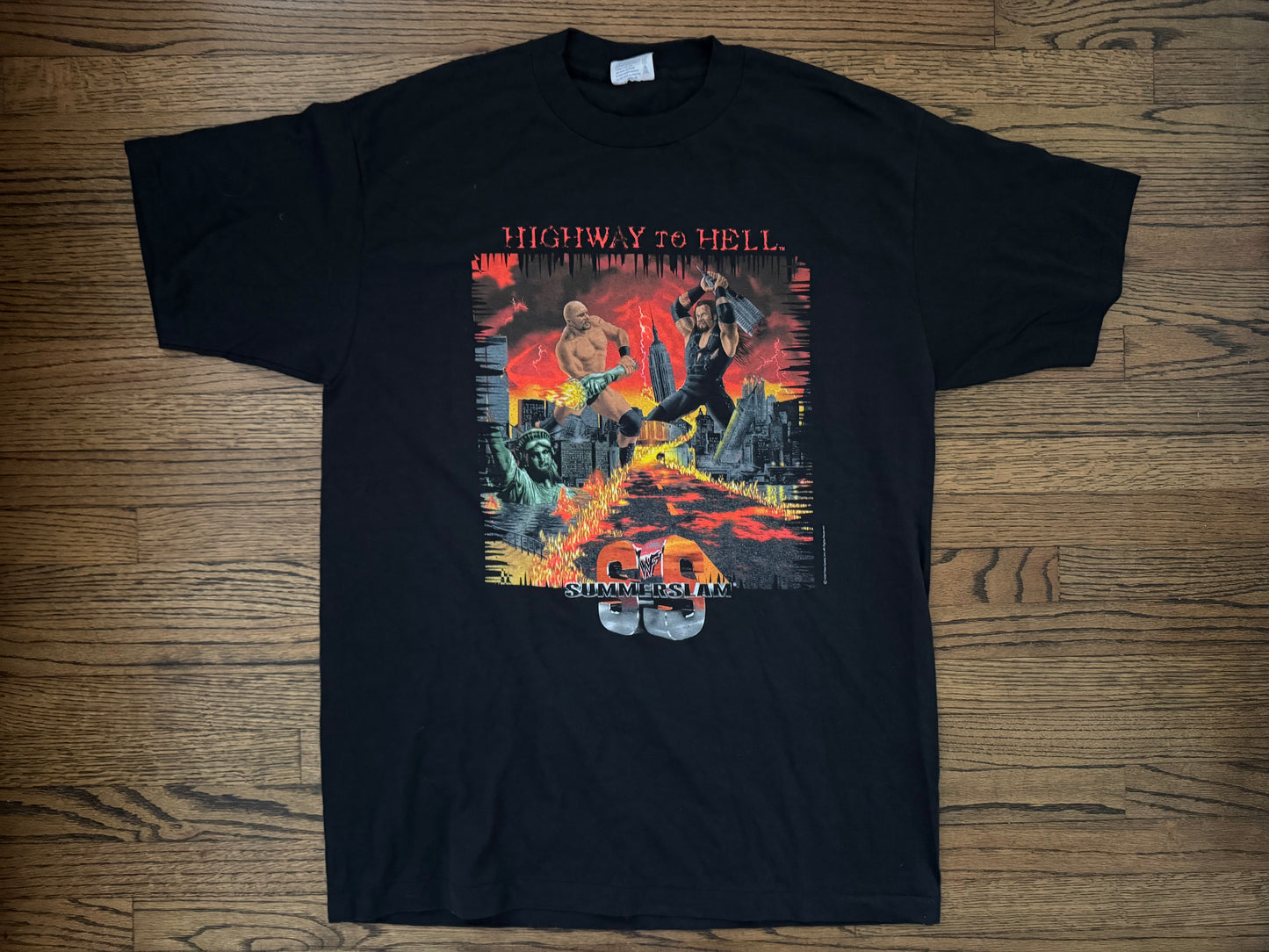 1998 WWF Summerslam crew shirt featuring “Stone Cold” Steve Austin and the Undertaker