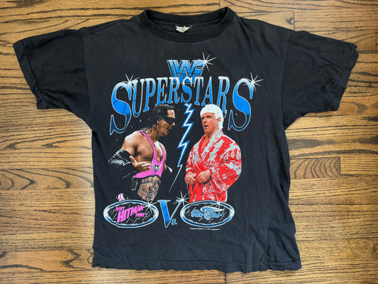 1992 WWF Superstars shirt featuring Intercontinental Champion Bret “The Hitman” Hart and The Real World’s Champion “The Nature Boy” Ric Flair
