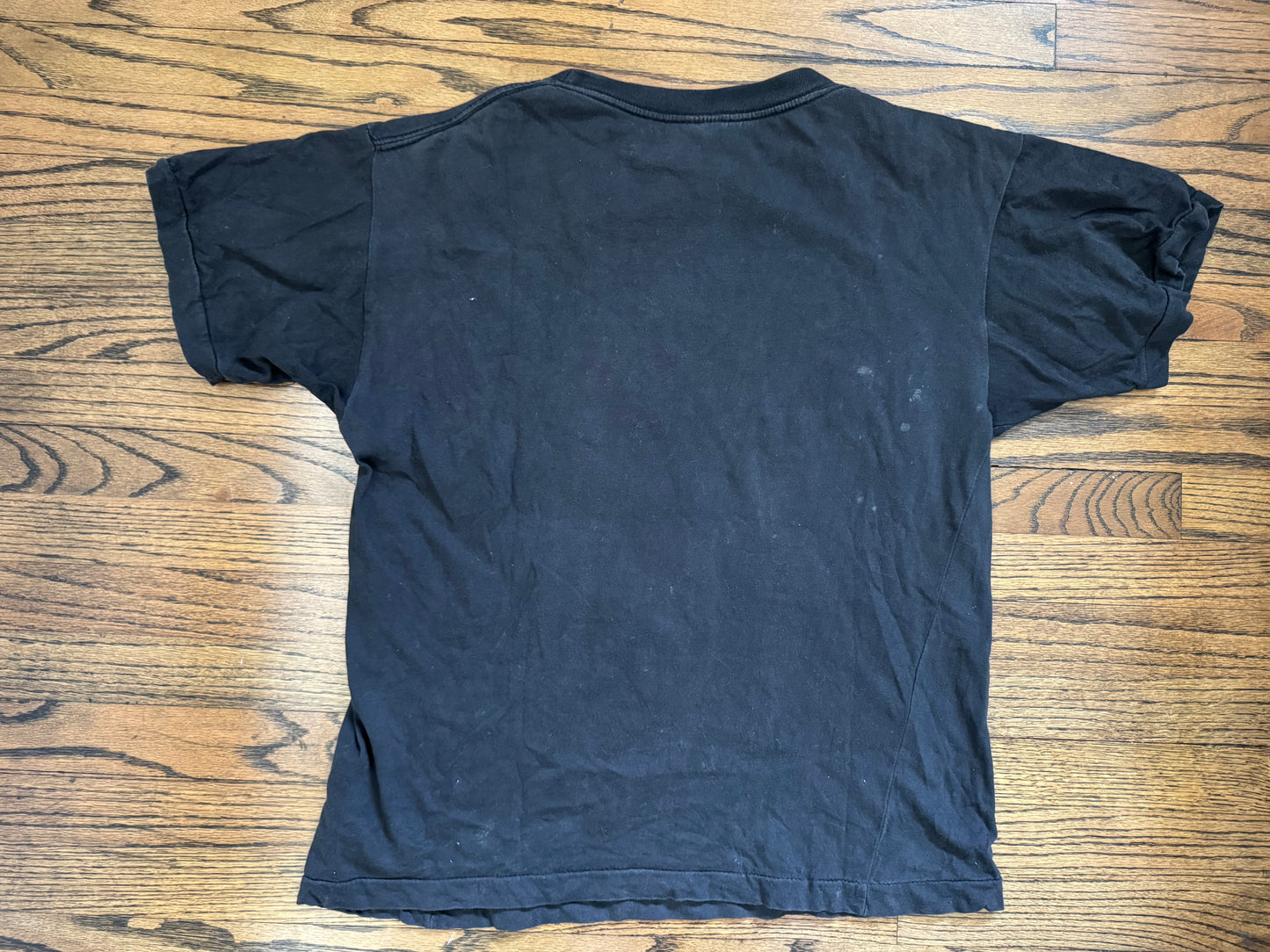 1992 WWF Superstars shirt featuring Intercontinental Champion Bret “The Hitman” Hart and The Real World’s Champion “The Nature Boy” Ric Flair