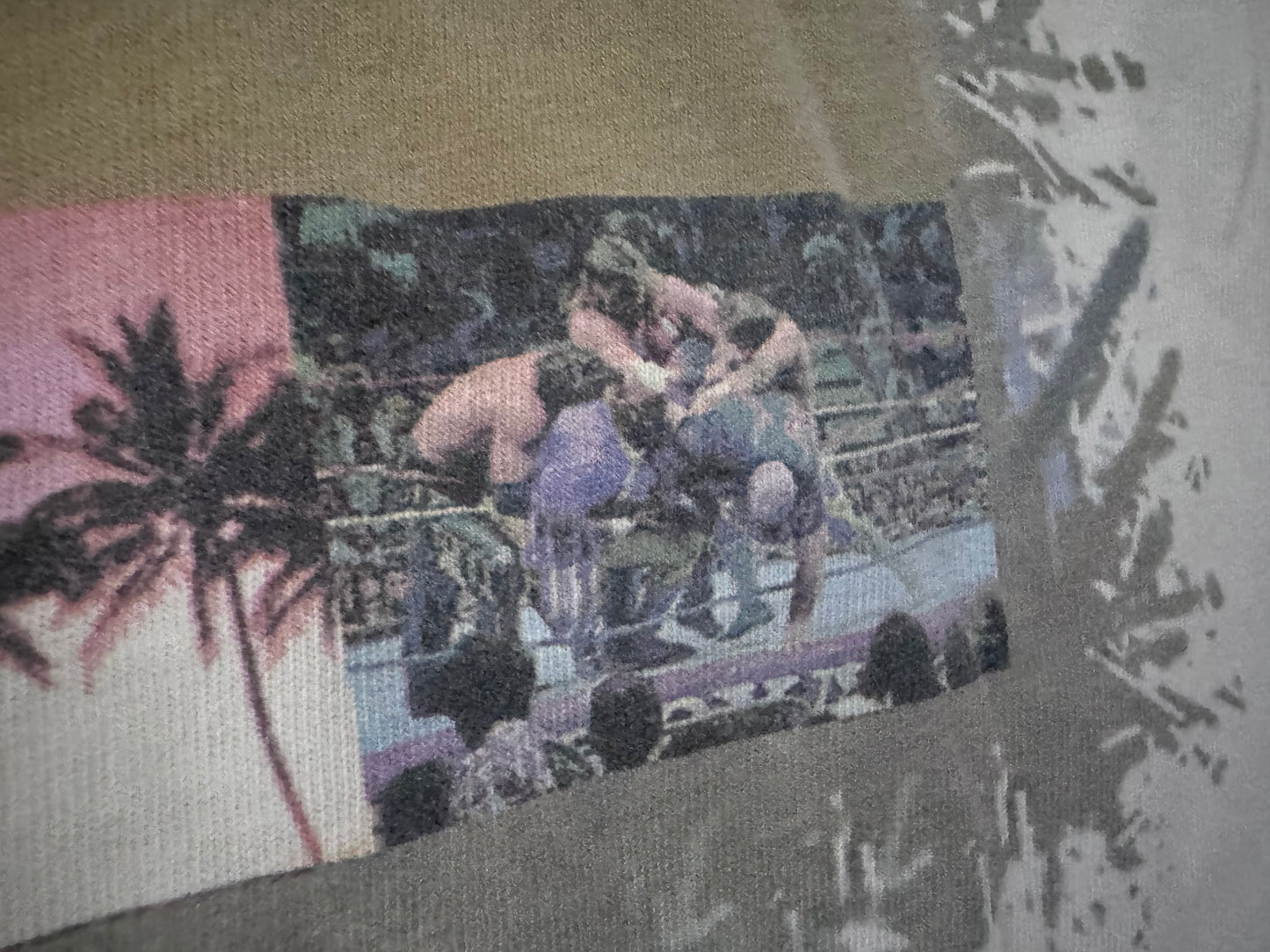 1995 WWF Royal Rumble shirt featuring a Flamingo, Bam Bam Bigelow, Crush’s 3rd gimmick in 3 years, Tatanka, Fatu, Sir Mo, Maybe the Smoking Gunns? Palm Trees, Lex Luger and Adam Bomb