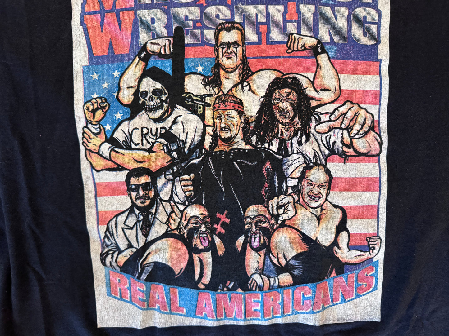 1997 FMW “Funk Masters of Wrestling” / “Real Americans” shirt featuring Terry Funk, Mike Awesome, Super Leather, The Headhunters, Victor Quiñones, Hisakatsu Oya and The Crypt Keeper
