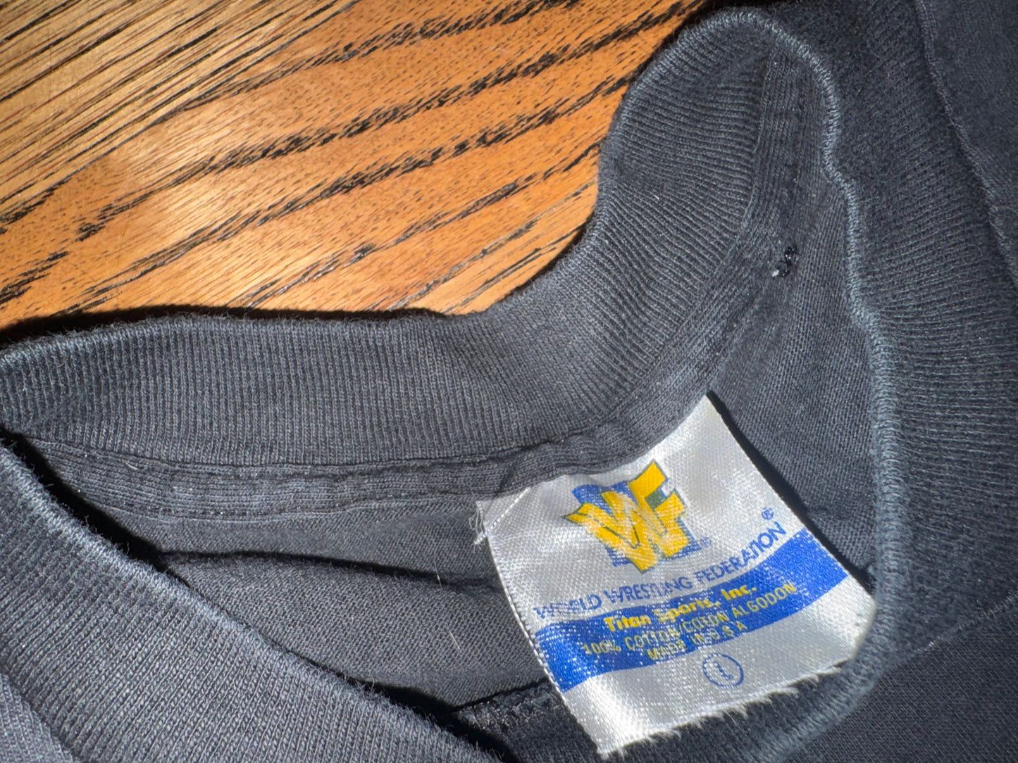 1998 WWF Wrestlemania XIV crew shirt featuring “Stone Cold” Steve Austin, “The Heartbreak Kid” Shawn Michaels and “Iron” Mike Tyson