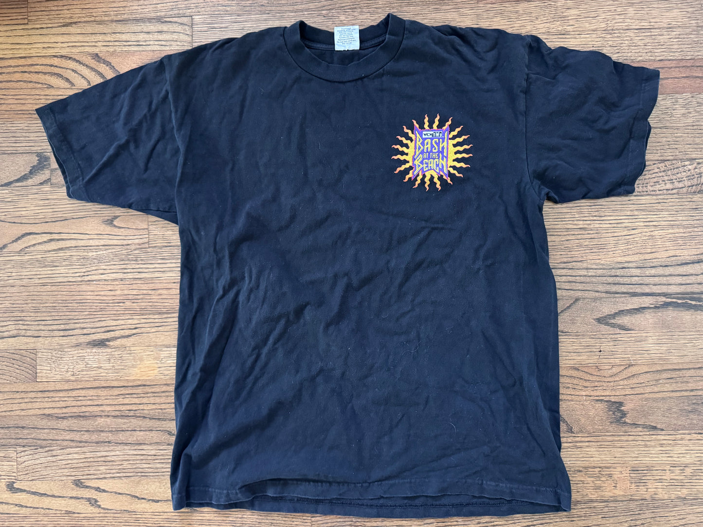 1998 WCW / n.W.o. Bash at the Beach event shirt featuring “Hollywood” Hulk Hogan, “Rodzilla” Dennis Rodman, “The Mailman” Karl Malone and Diamond Dallas Page

Size: XXL