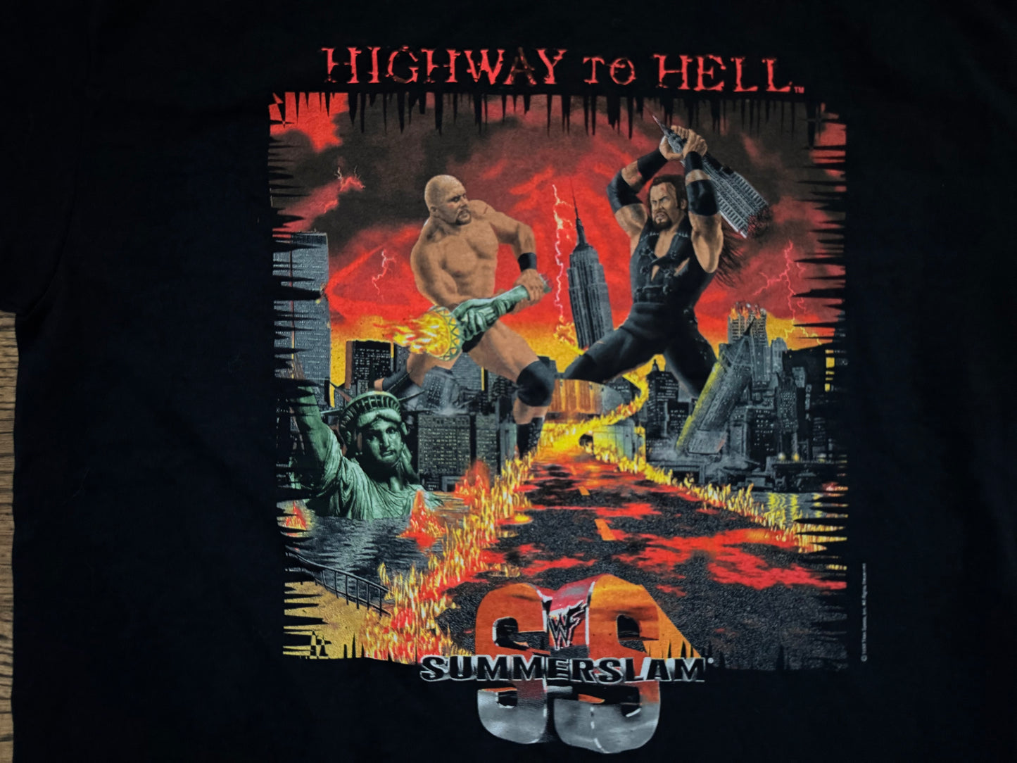 1998 WWF Summerslam crew shirt featuring “Stone Cold” Steve Austin and the Undertaker