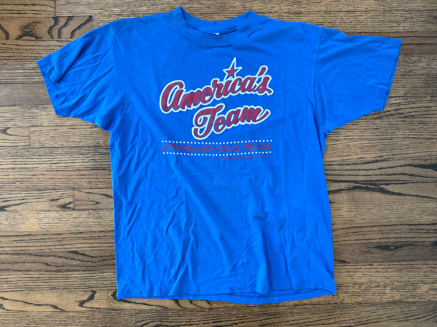 1985 NWA JCP Dusty Rhodes and Magnum TA “America’s Team” catalog shirt