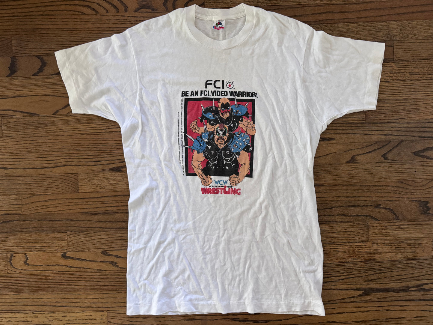 1990 WCW / FCI World Championship Wrestling for Nintendo shirt featuring The Road Warriors: Hawk and Animal