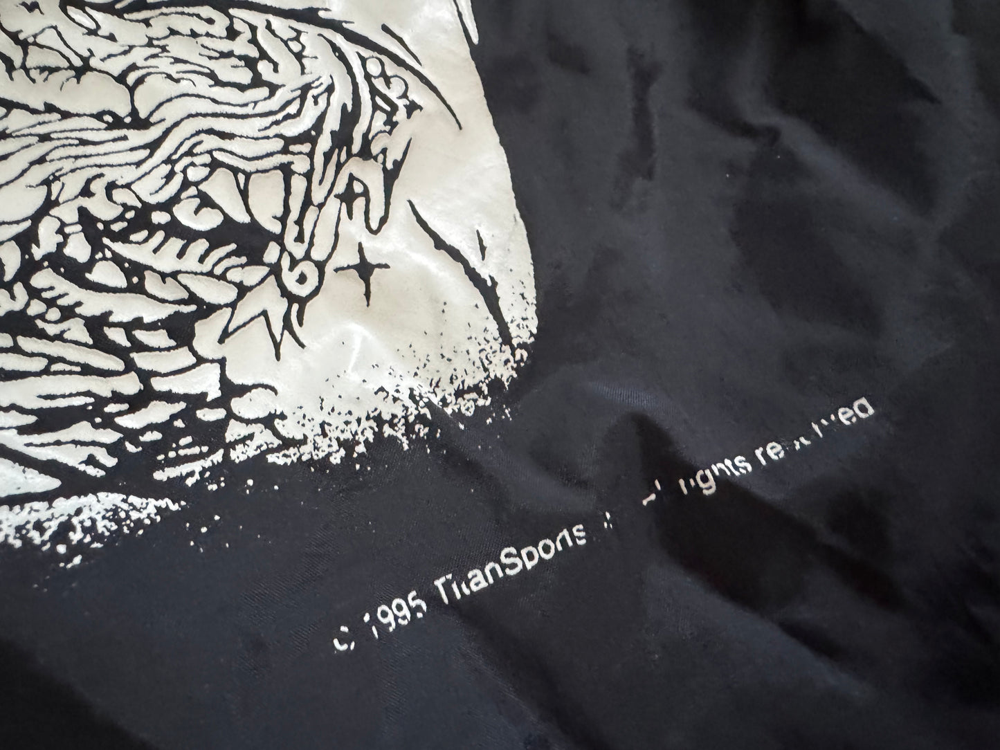 1995 WWF Undertaker windbreaker jacket with a zip up