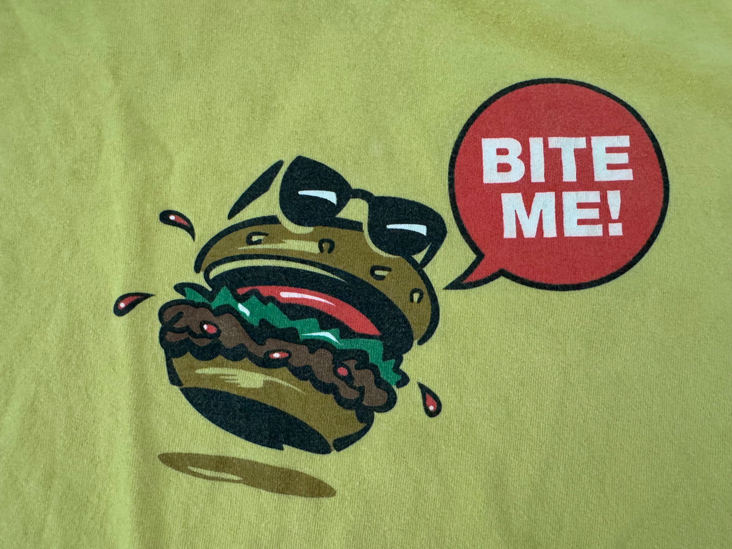 1999 “Mean” Gene Okerlund “Mean Gene Burgers” - “The Burger That Says Bite Me” two sided shirt