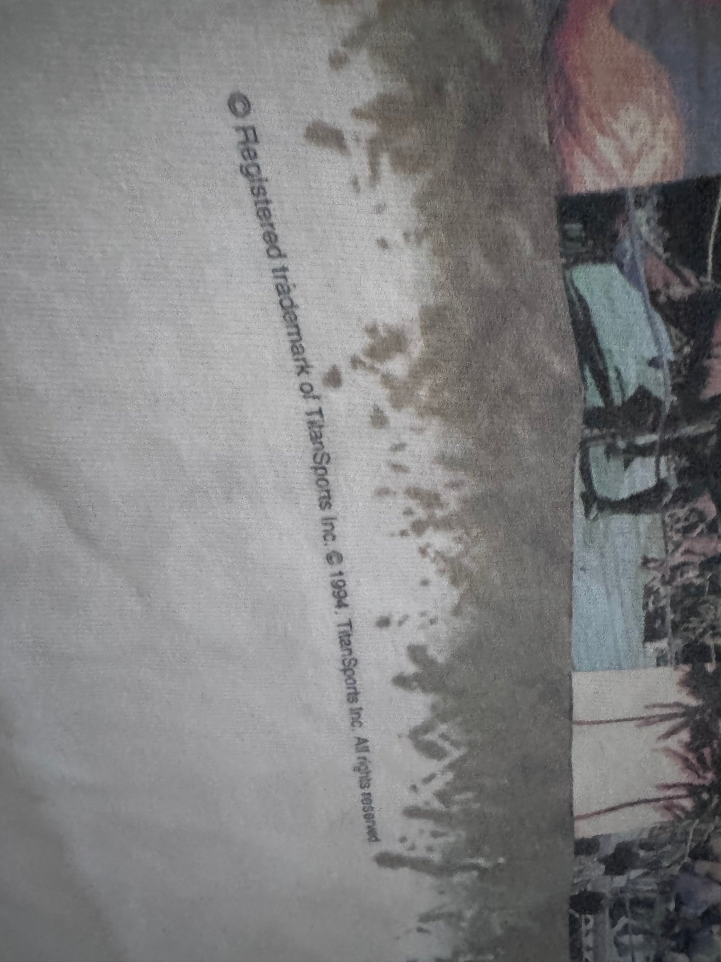 1995 WWF Royal Rumble shirt featuring a Flamingo, Bam Bam Bigelow, Crush’s 3rd gimmick in 3 years, Tatanka, Fatu, Sir Mo, Maybe the Smoking Gunns? Palm Trees, Lex Luger and Adam Bomb