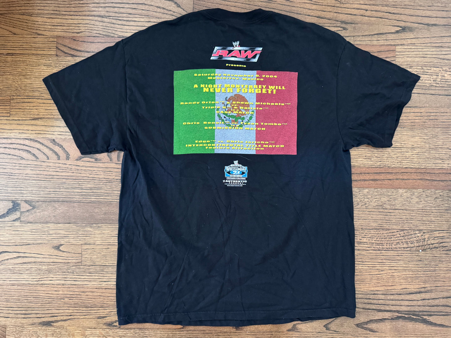 2004 WWE “A Night Monterrey Will Never Forget” shirt featuring Batista, Randy Orton, Shawn Michaels , HHH, Edge, Chris Jericho, Chris Benoit and Tyson Tomko two sided shirt