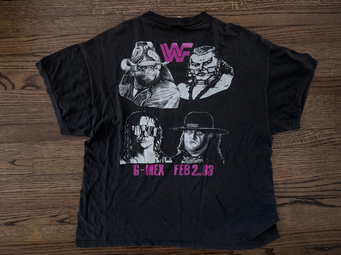 1993 WWF House show shirt featuring the World Wrestling Federation logo, Bret Hart, Tatanka, Undertaker and Randy Savage