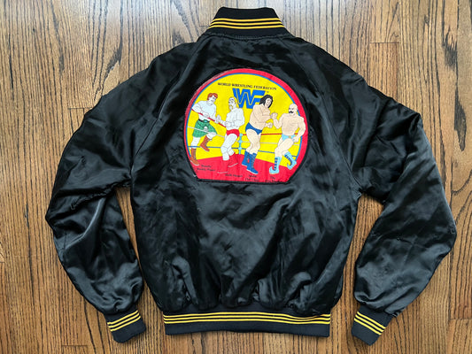 1985 WWF Satin jacket featuring the World Wrestling Federation logo, Hulk Hogan, Andre The Giant, Iron Sheik and “Rowdy” Roddy Piper