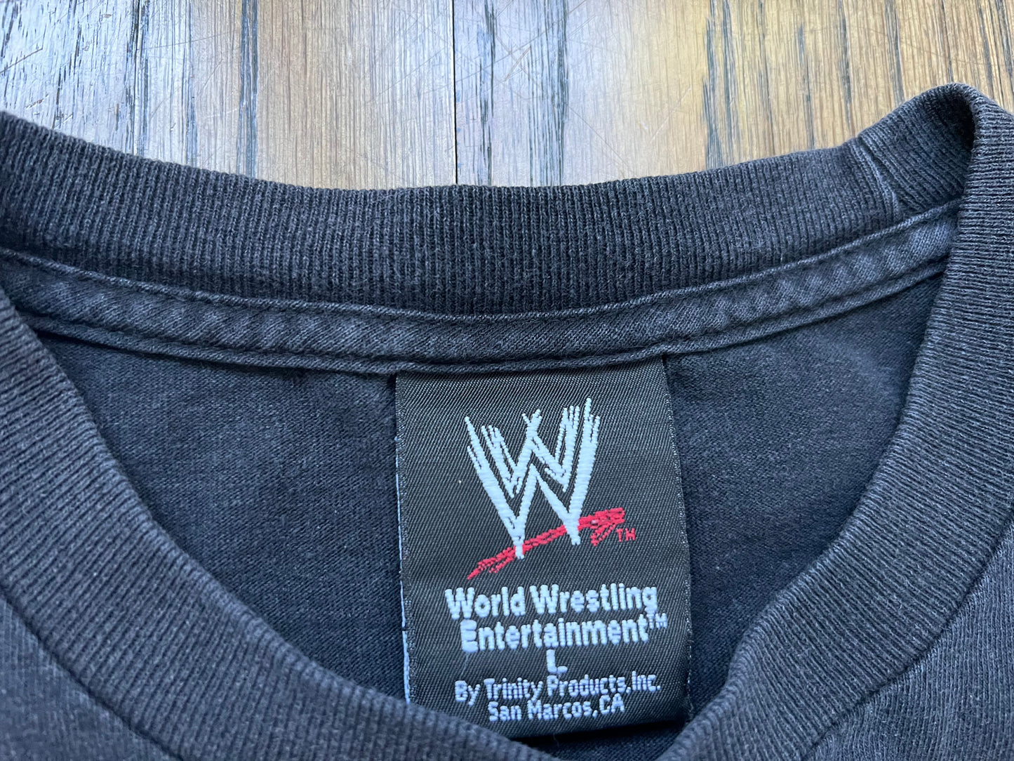 2003 WWE Backlash shirt featuring “The Doctor of Thuganomics” John Cena, “The Next Bog Thing” Brock Lesnar, Goldberg and The Rock